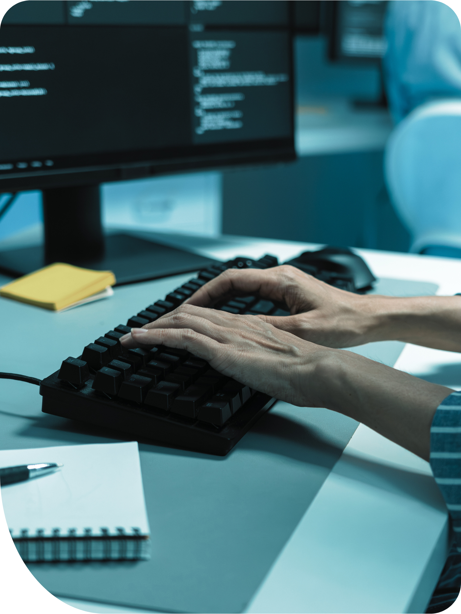 Female lawyer seated at desk with scale ornament